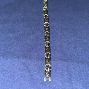 Stainless steel men’s bracelet.